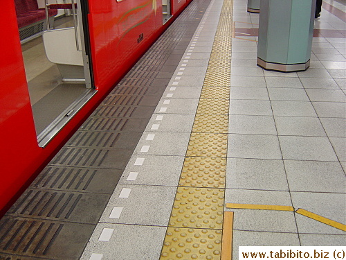 Ubiquitous yellow line with raised dots for the visually impared