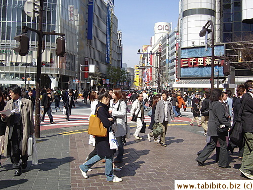 A crossing in Shibuya at 2pm on Wed, volume of people swells several times on weekends and in the evening