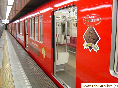The entire train painted in red to mark the 50th anniversary of the train? Or Gana chocolate?