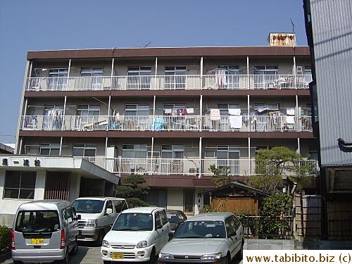 Apt building and washing hanging in the balcony