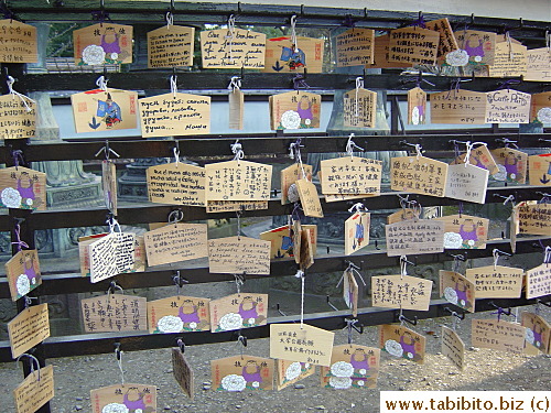 People write their wishes on these plaques