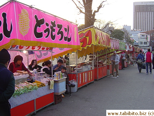 A row of food vendors in Ueno Park