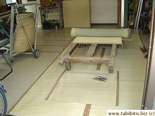 Tatami in the making. Owner's nowhere to be found. I actually walked right into his shop to take this picture