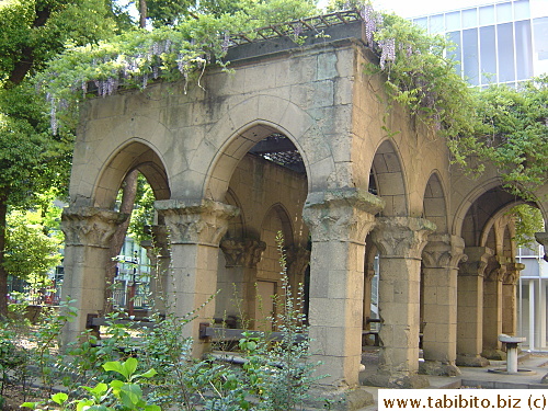 This lime stone gazebo inside Tokyo University with wisteria trailing down its roof has a European feel