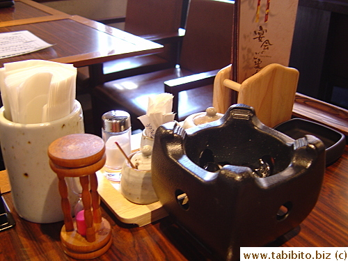 Every table has a three-minute hourglass, the exact time needed for the steamed rice to rest before its lid is to be opened. The restaurant is so meticulous