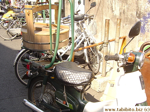 Food delivery bike with its old-fashioned wooden carry case