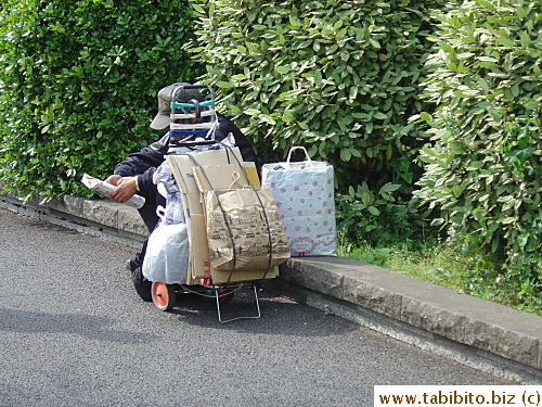 A homeless man and his belongings 