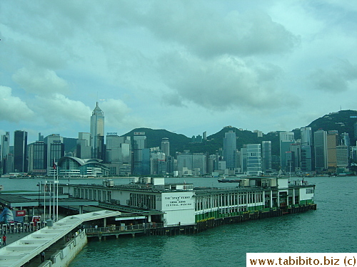 Star Ferry and Victoria Harbour through a glass window