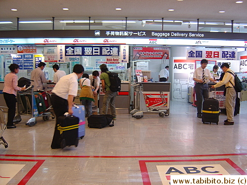 People getting baggage transfer company to deliver their bags for them from Narita airport