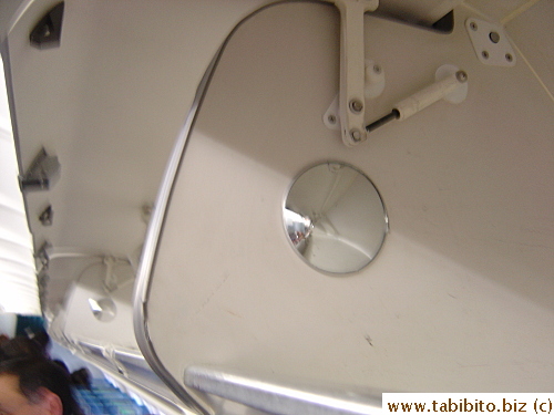 Did you know there's a mirror inside the overhead bin on the plane?