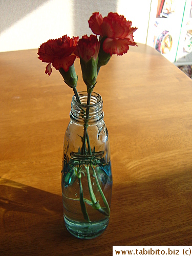 Marble soda bottle holds up flowers nice and straight