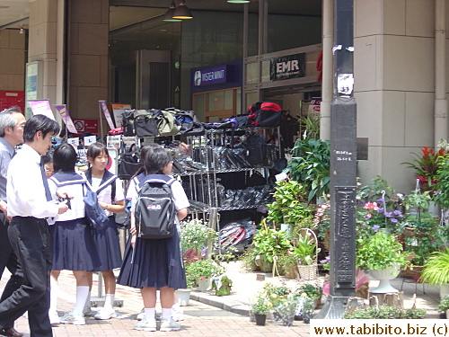 Highschool girls in sailor-style uniforms