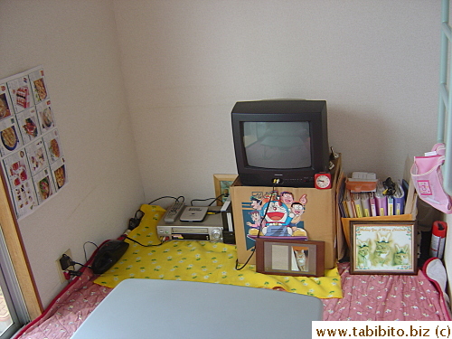 Entertainment center. The TV sits on its own box