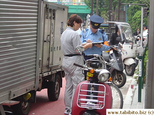 A truck driver booked for illegal parking. Her truck was parked way up in the crossing blocking traffic