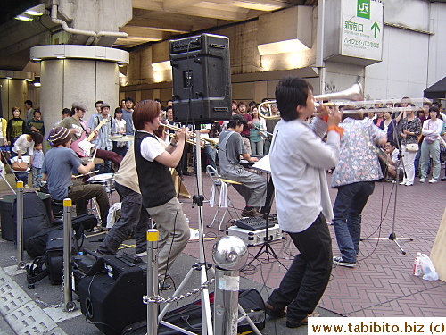 A serious band playing in Shinjuku