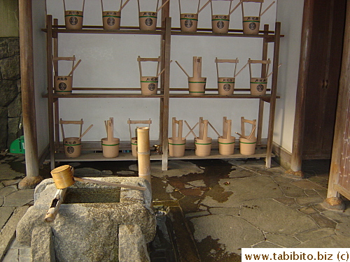 Buckets for people to carry water to the cemetery to fill the vases on the tombstones and to cleanse the wooden planks
