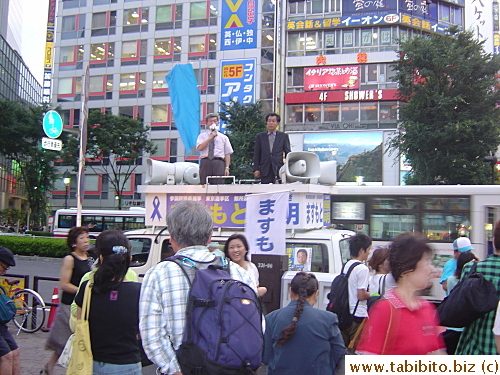 Politicians woo voters. The man speaks through four mics and still, not many people show interest