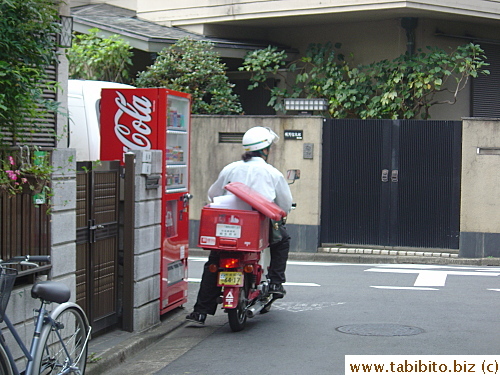 I was only able to get our now uniform-wearing postman's back shot