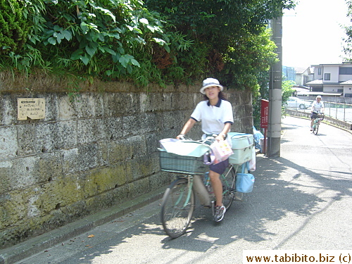 Two yakult ladies zip past me. I got the sample pack from the first lady days ago