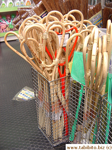 A bunch of futon beaters for sale, among them some fly swatters