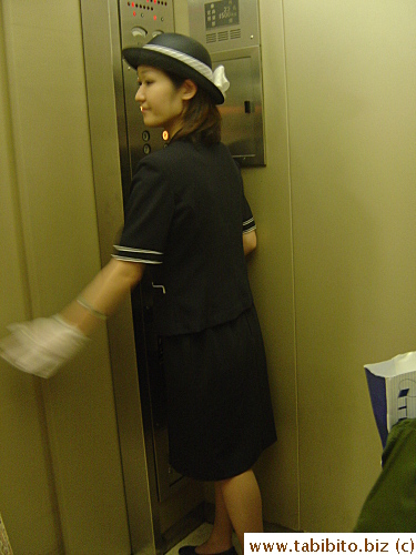 Elevator Lady at Isetan Department Store