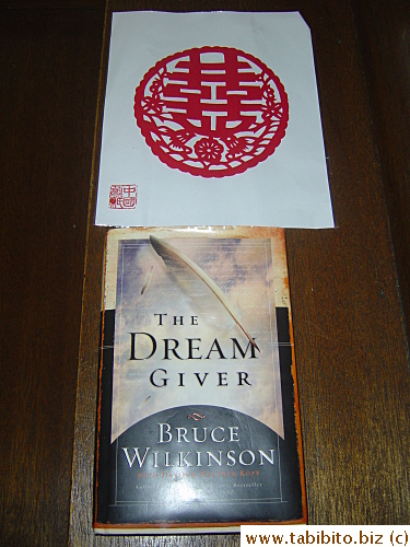 Souvenirs from our friends. Top: Chinese character cut-out, the word means happiness. Bottom: A book brought from the US