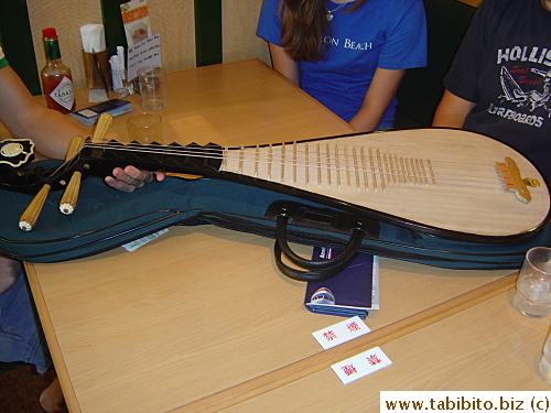 The Chinese guitar our friends' son bought in China, only cost US$60