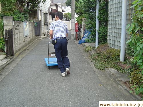 This man from Sagawa Transport delivered my bike