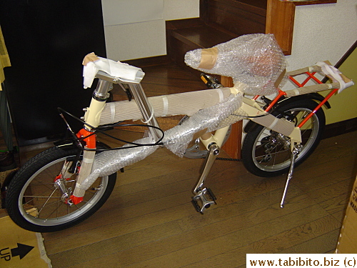 Right out of the box. The handlebars are folded down