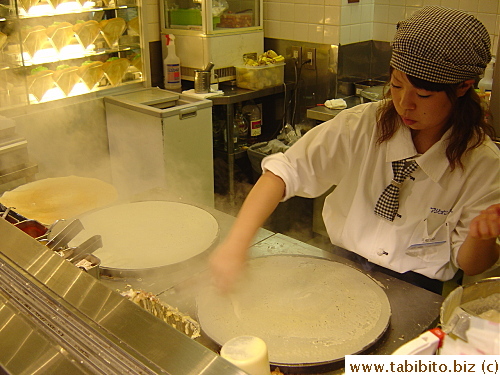 This woman is making our crepes