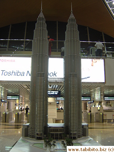 A Twin Towers model just in front of the immigration counters in KL Airport.  There's no sign that says photographs are not allowed, in fact there were a couple of officers around me and they didn't seem to care what I was doing so I took its picture.  