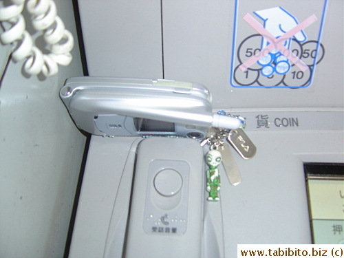 A forgetful person left her cell phone on the ATM