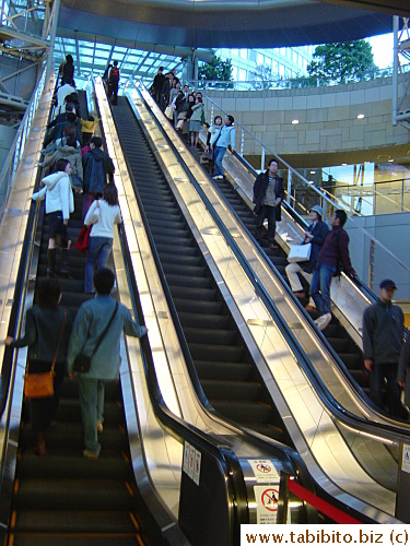 The long escalators that connect the subway exit and Roppongi Hills