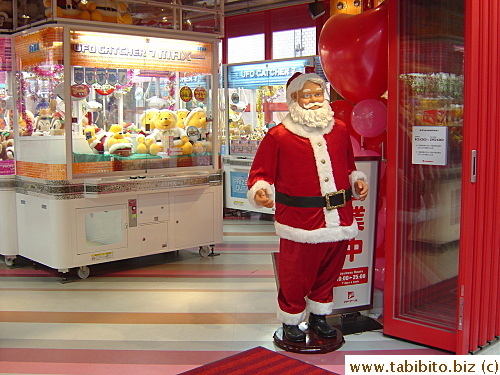 Life-size Santa adorns this store