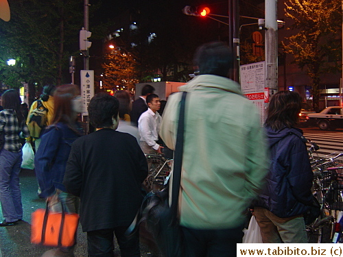 People gathered across the shopping street to gawk