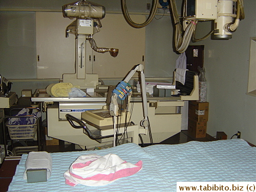 The table where I laid down for the ECG.  Notice the hard box-shaped Japanese pillow I rested my head on