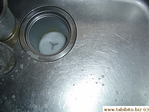 The sink was brown with coffee and food stain before, now it is spick-and-span
