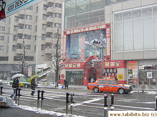 The usually busy Harajuku looks empty in bad weather