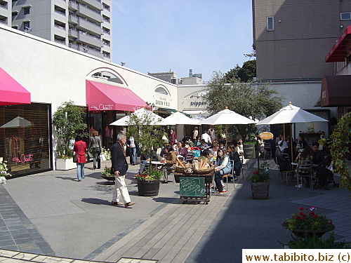 Chic boutiques stores surround Artifagose