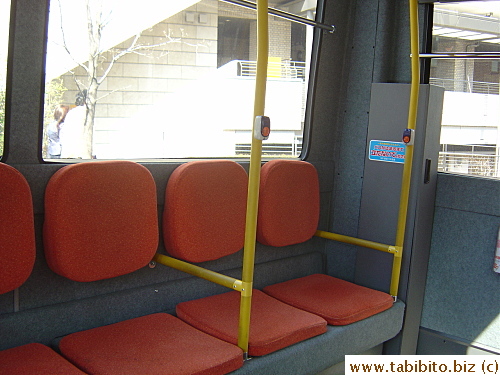 Orange seats inside the bus