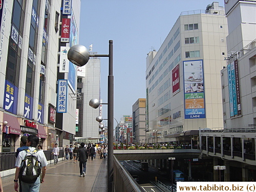 The main street in Machida is lined with dept stores and large shops