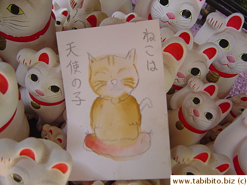 Somebody drew this card and put in amongst the cat figurines, it says: 
