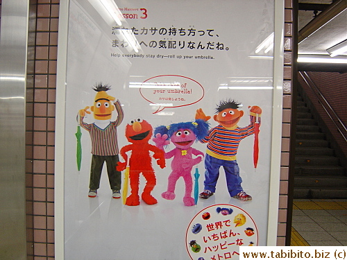 Sesame Street characters teach passengers proper manner regarding their brollies