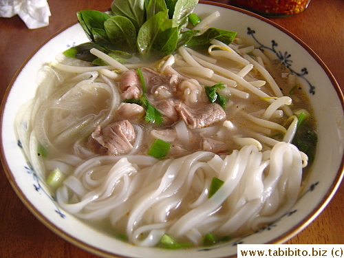 After just one minute, the fatty beef is cooked, and it's very very tender. The tasty soup's very fragrant from all the aromatic herbs.