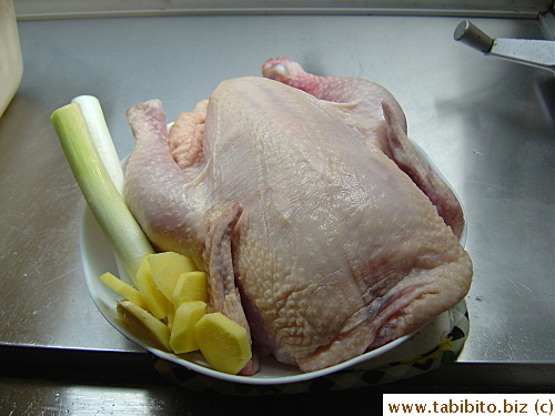 The chicken, Japanese leeks ( green onions will also work) and sliced ginger ready to go into the stock
