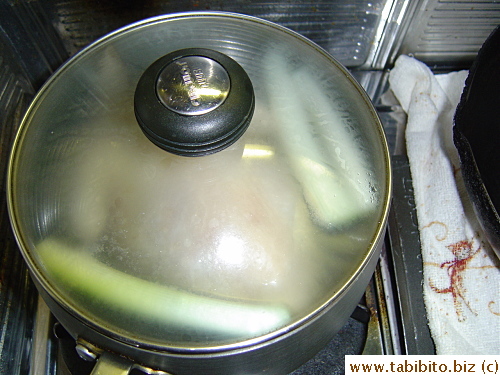 The stock is covered and simmered at the lowest possible heat for just 5 minutes and heat is then turned off. Absolutely no peeking or opening the lid till the stock cools down
