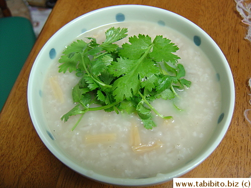 After a big lunch devouring the entire chicken and two helpings of the very delicious rice, I cooked congee (Chinese savory porridge) using the leftover chicken stock and dried scallops for dinner