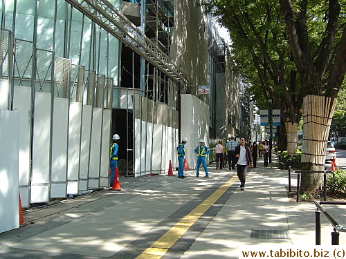 A lot of workers guard this construction site