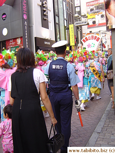 The parade guarded by police