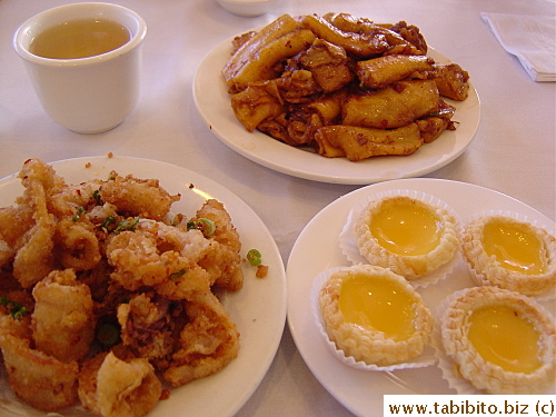 Some of the dimsum dishes we ate for lunch: Stir-fried rice rolls in XO sauce, mini egg tarts and deep-fried squids, all very delicious